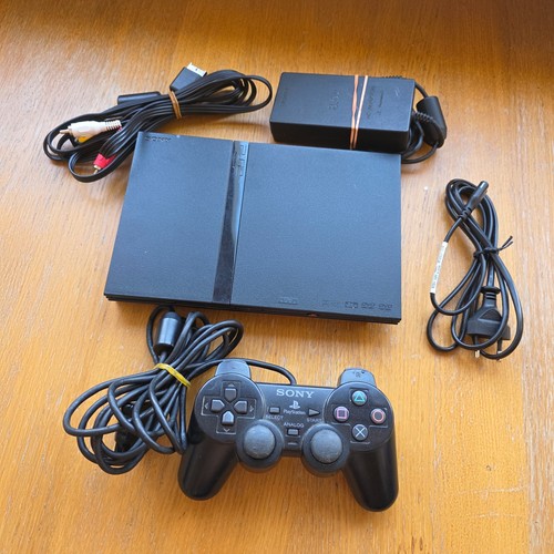 Console playstation slim - 2,