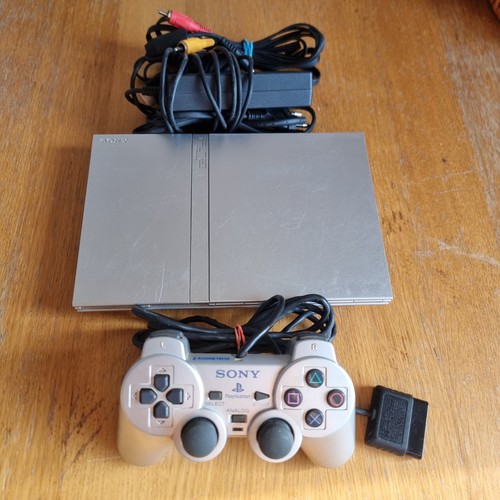 Console playstation slim - 2,